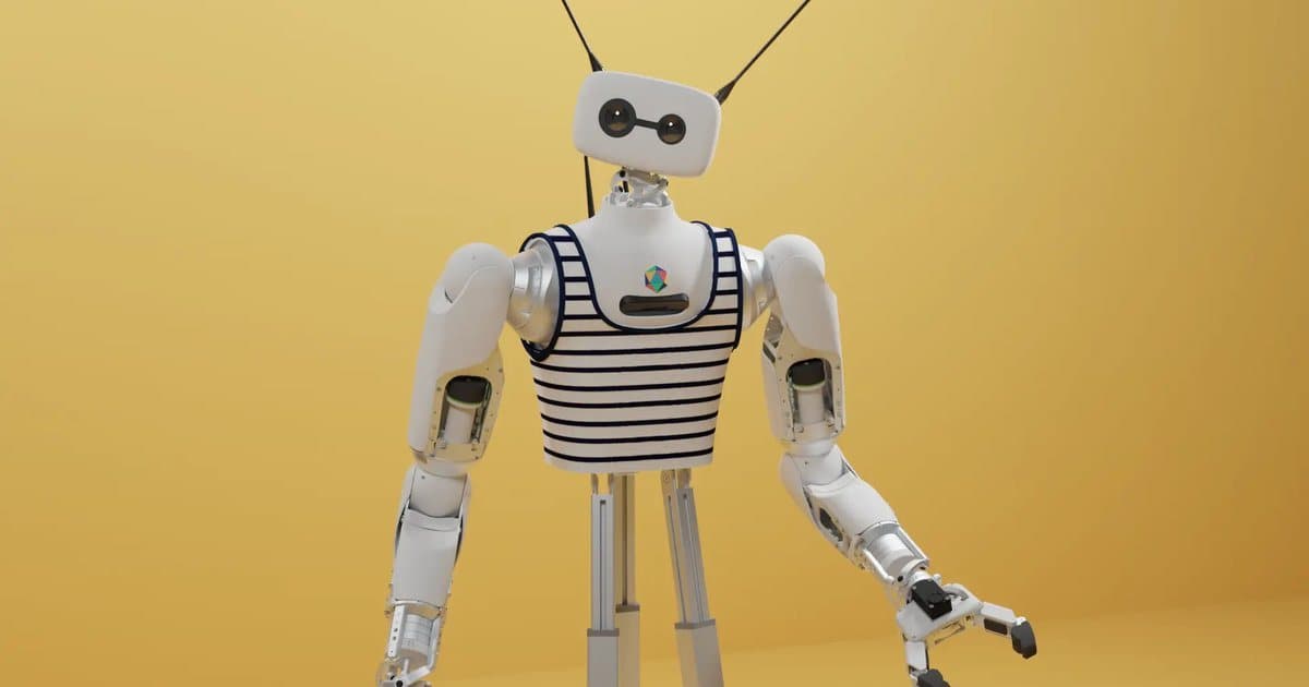 Pollen Robotics' Reachy 2 humanoid robot in a striped top, with two white robotic arms and grippers, against a yellow background.