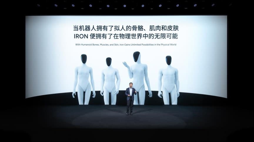 Four of XPENG's IRON humanoid robots on stage at XPENG AI Day.